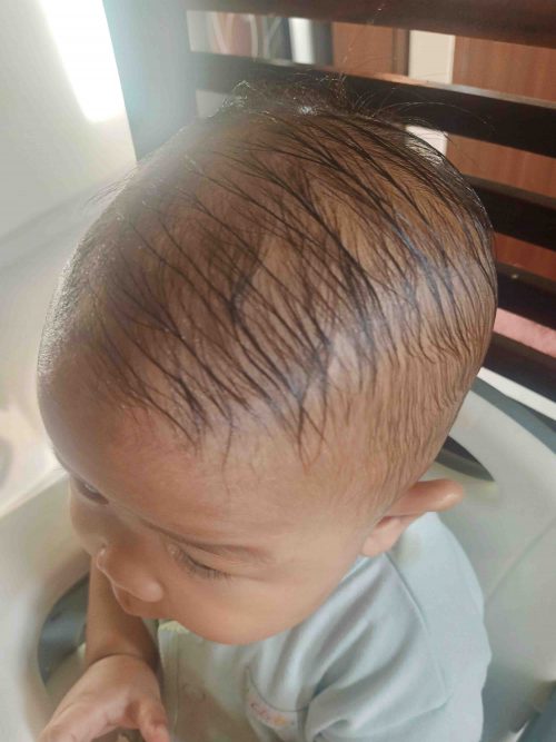 rambut bayi dioles minyak kemiri